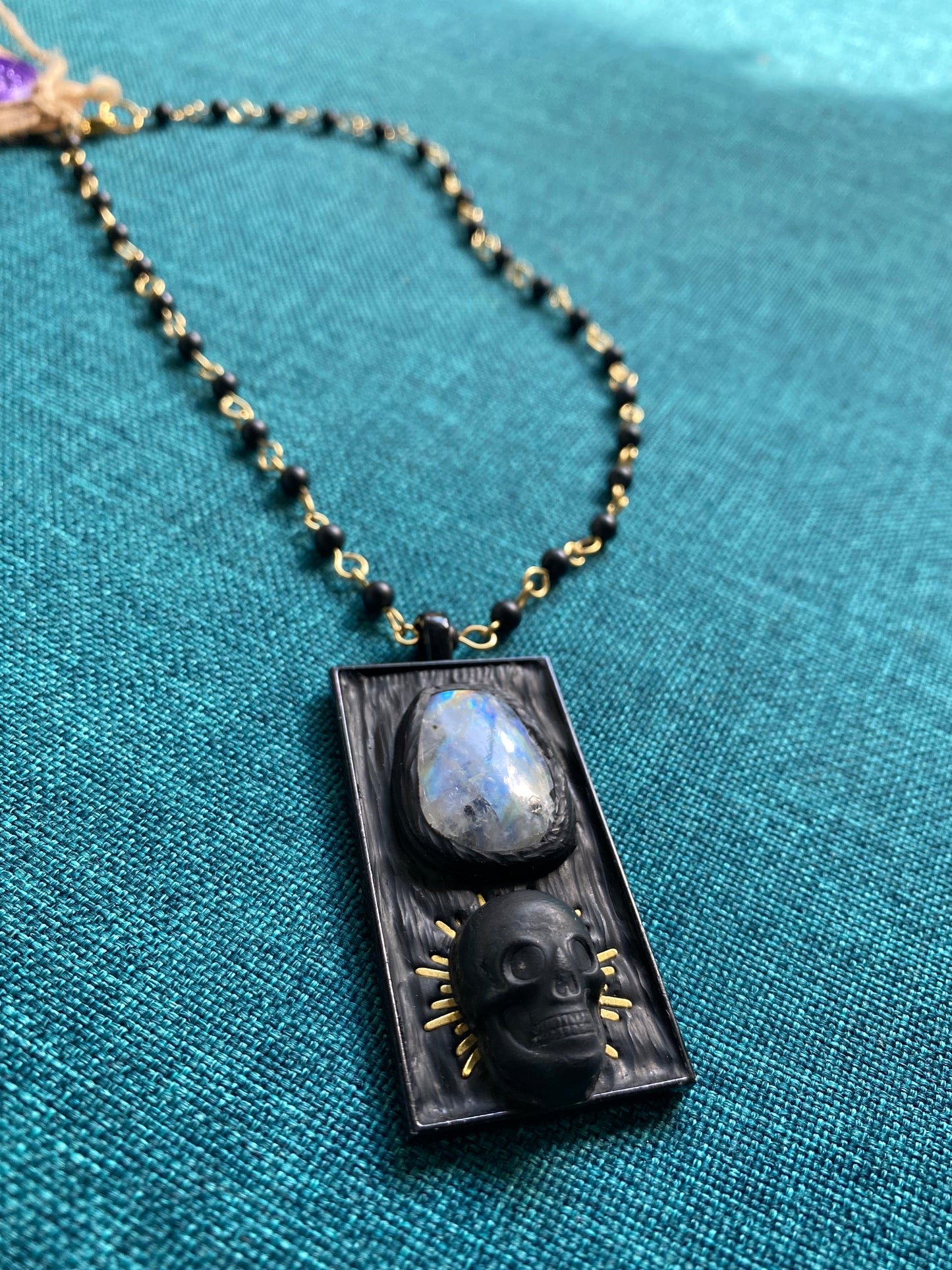 Black moonstone and radiant skull hand beaded necklace
